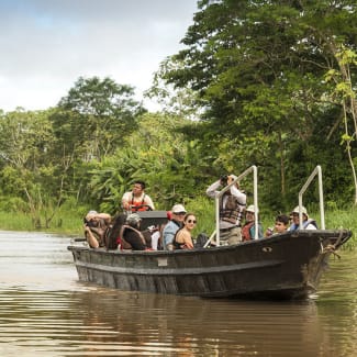 People on the skiff in the Amazon